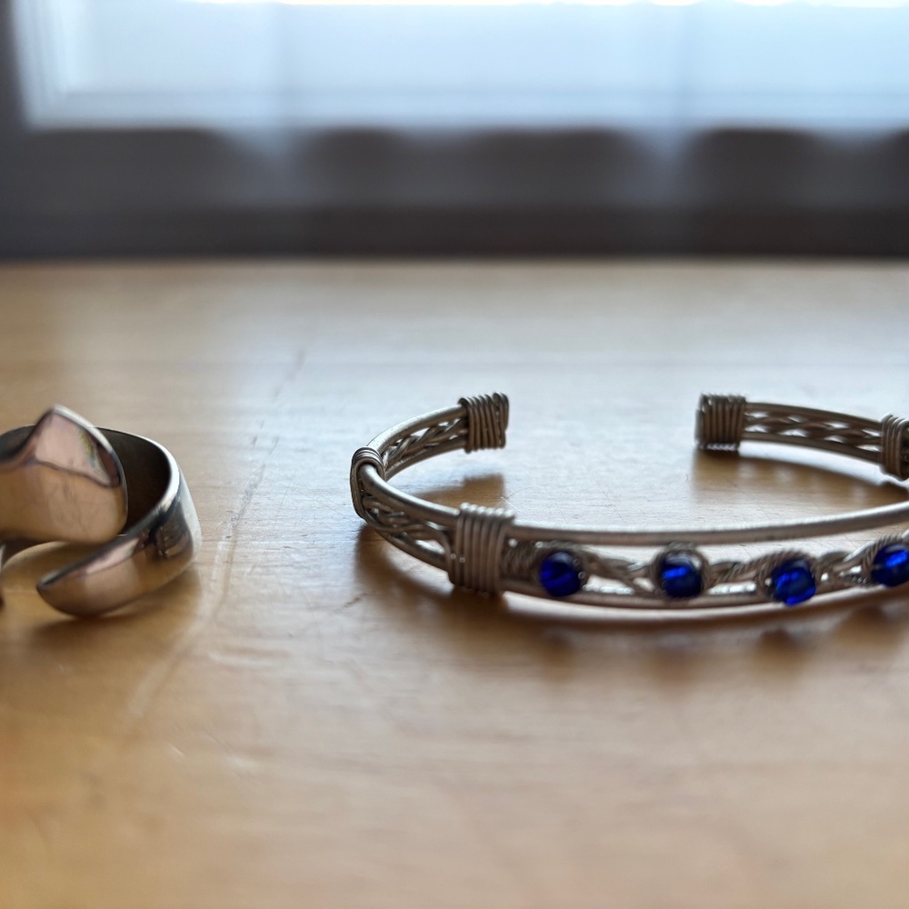 metal bracelet with bright blue glass plus ring made out of cutlery